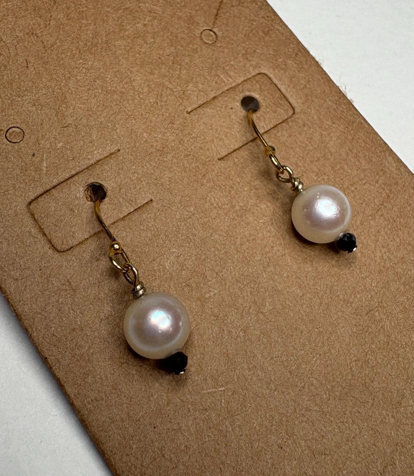 14k gold dangle earrings with 6mm Akoya pearls and 2mm black diamond beads.