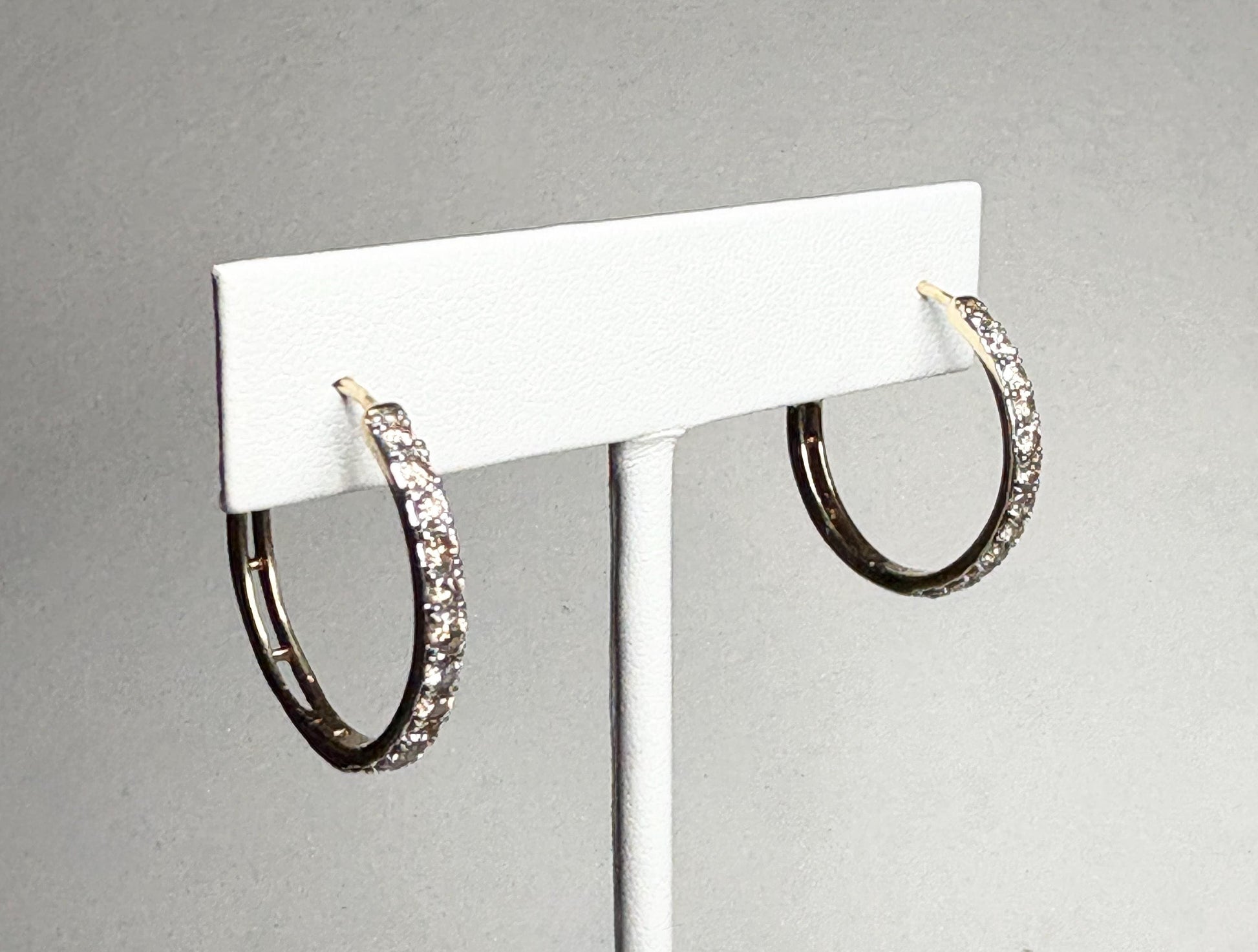10k gold hoop earrings with channel-set champagne or chocolate brown diamonds.