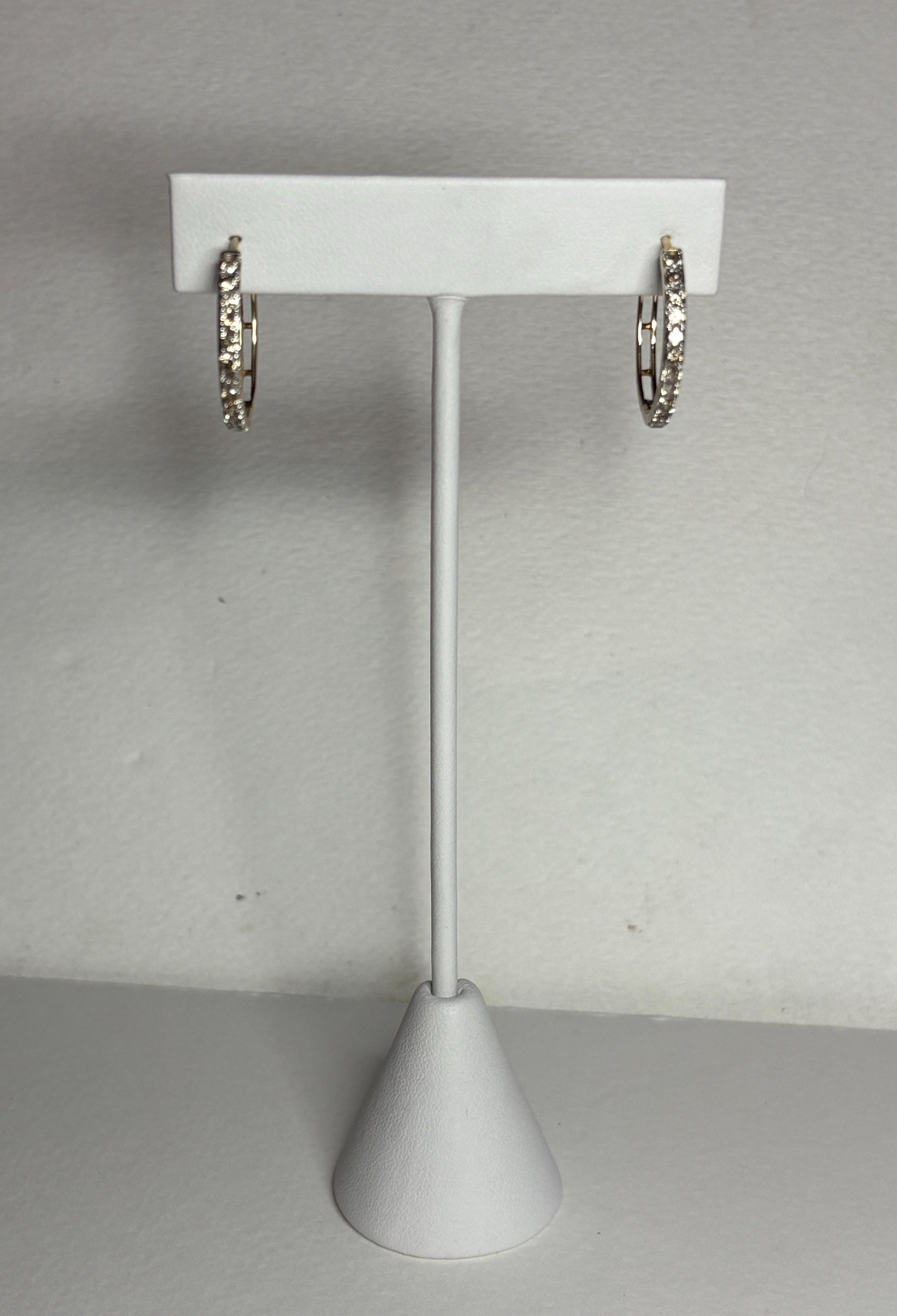 Hoop earrings with champagne or chocolate colored diamonds channel set in 10k gold.