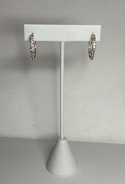 Hoop earrings with champagne or chocolate colored diamonds channel set in 10k gold.