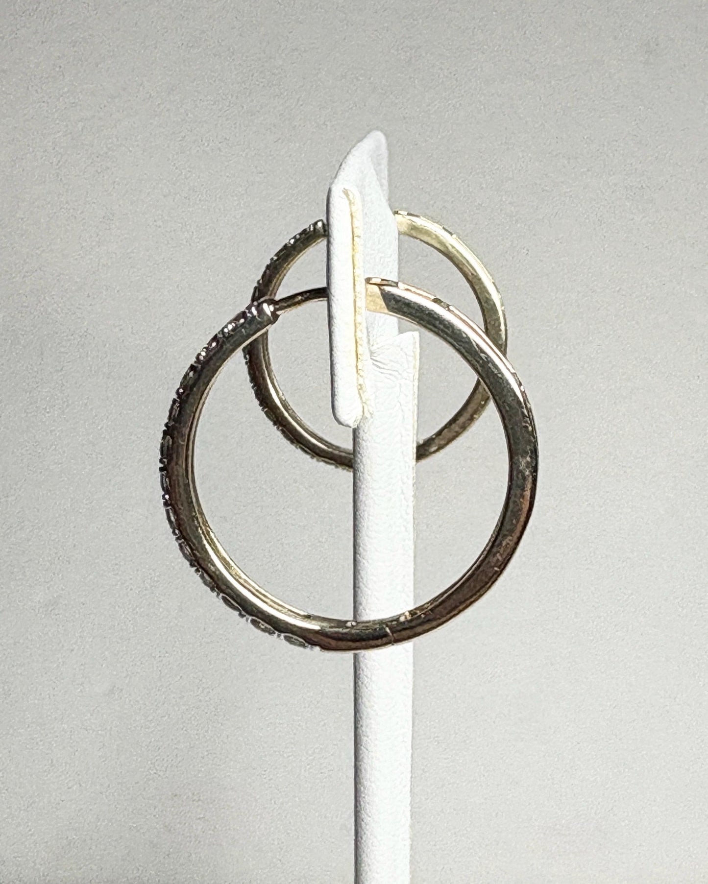 10k gold hoop earrings with channel-set champagne or chocolate diamonds.