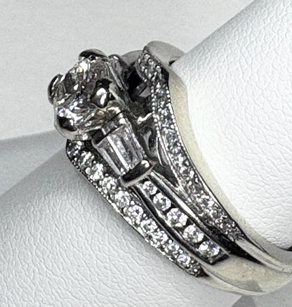 14k white gold ring with baguette and round diamonds.