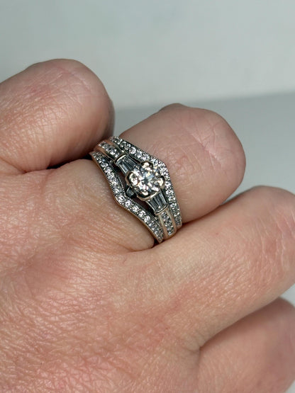 14k white gold ring with round and baguette diamonds.