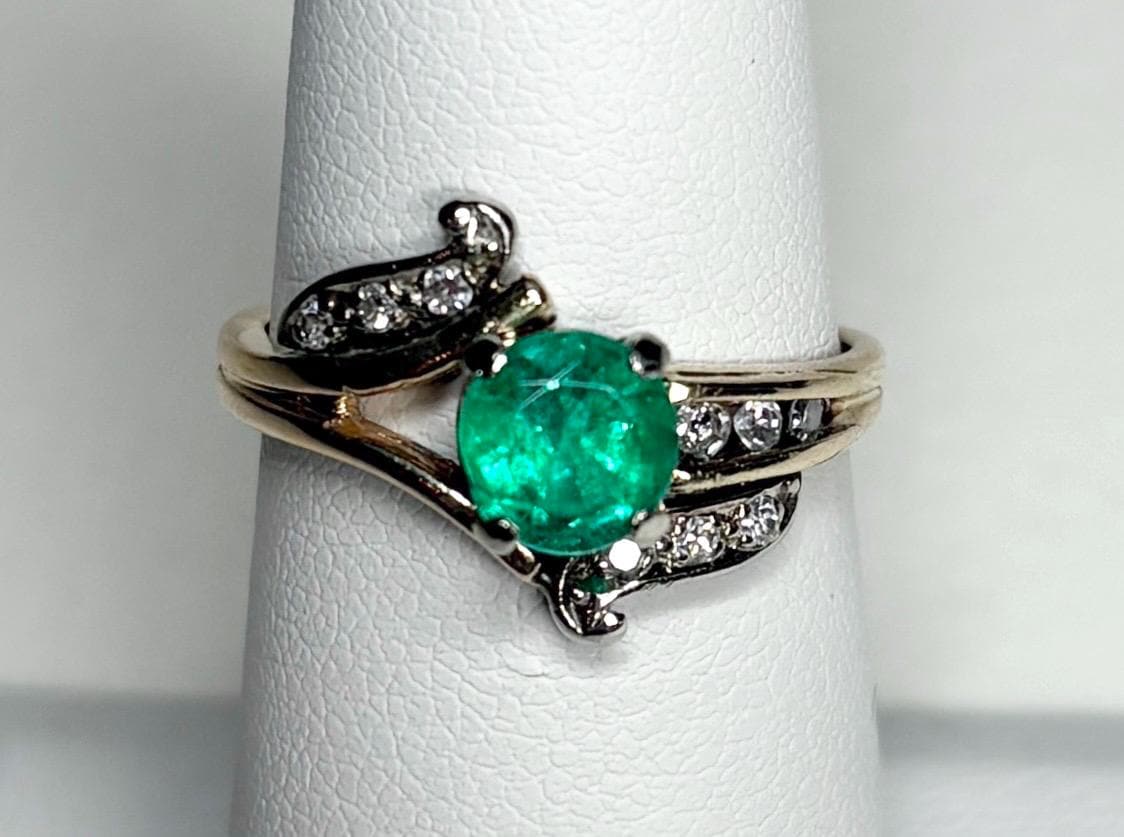Vintage 14k gold ring with emerald and single cut diamonds.