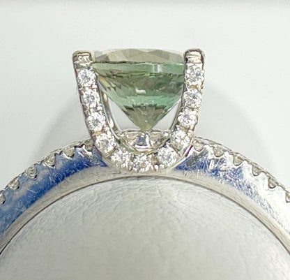 18k white gold ring with a bicolor Oregon sunstone and diamonds.