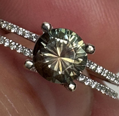 A bicolor Oregon sunstone ring with diamonds in 18k white gold.