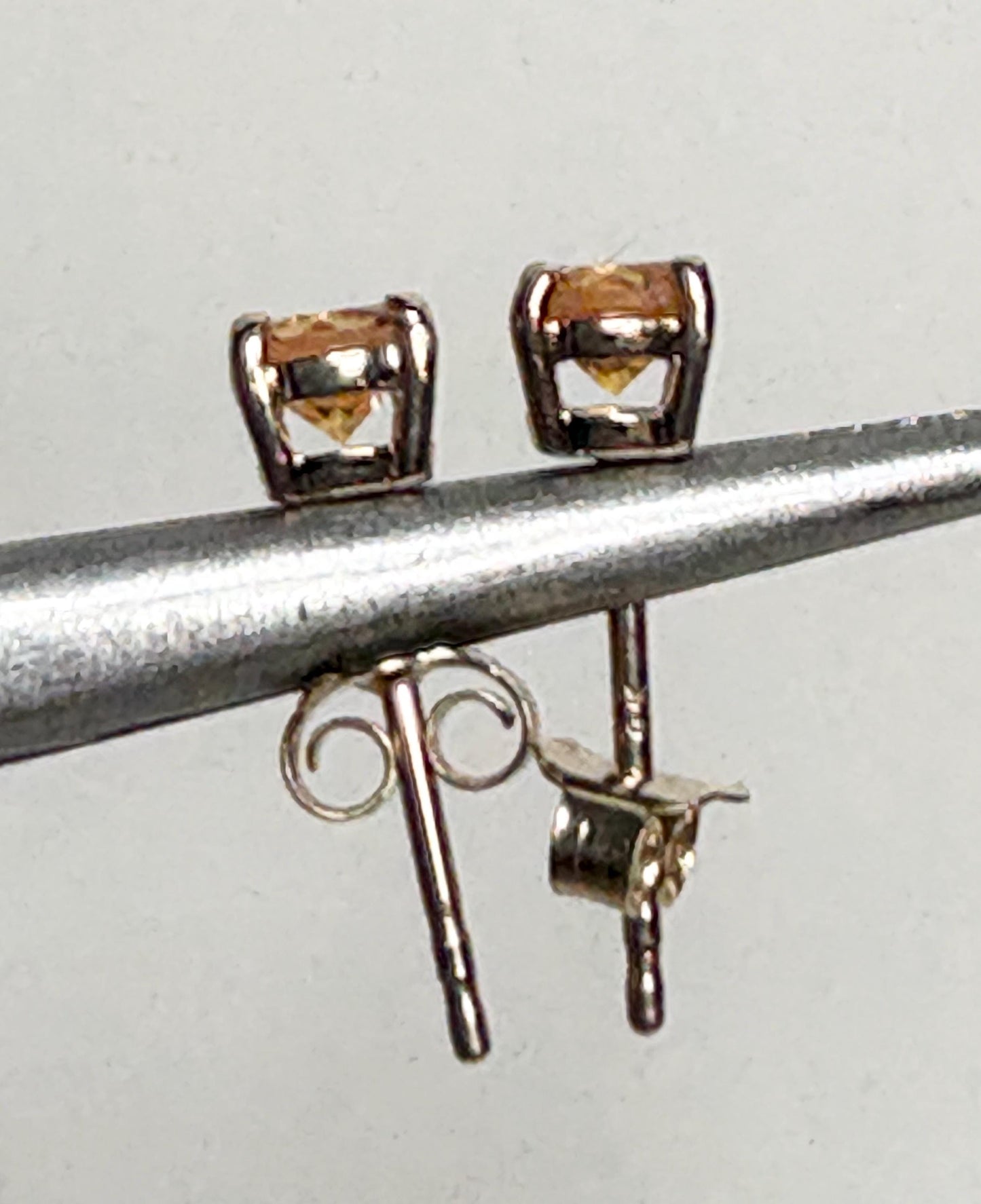 Spessartite garnet stud earrings in solid 9k gold.