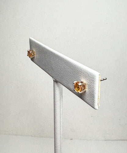 Spessartite garnet stud earrings in solid 9k gold.