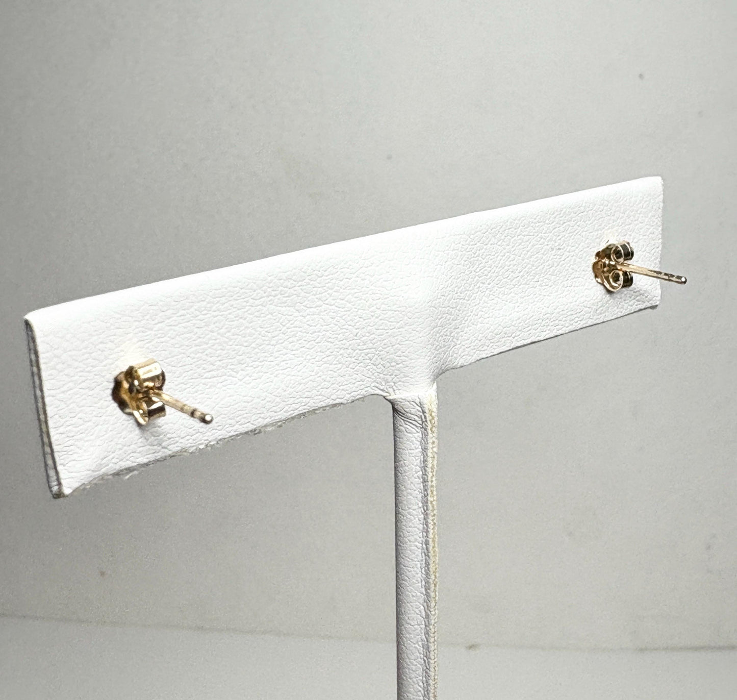 Spessartite garnet stud earrings in solid 9k gold.