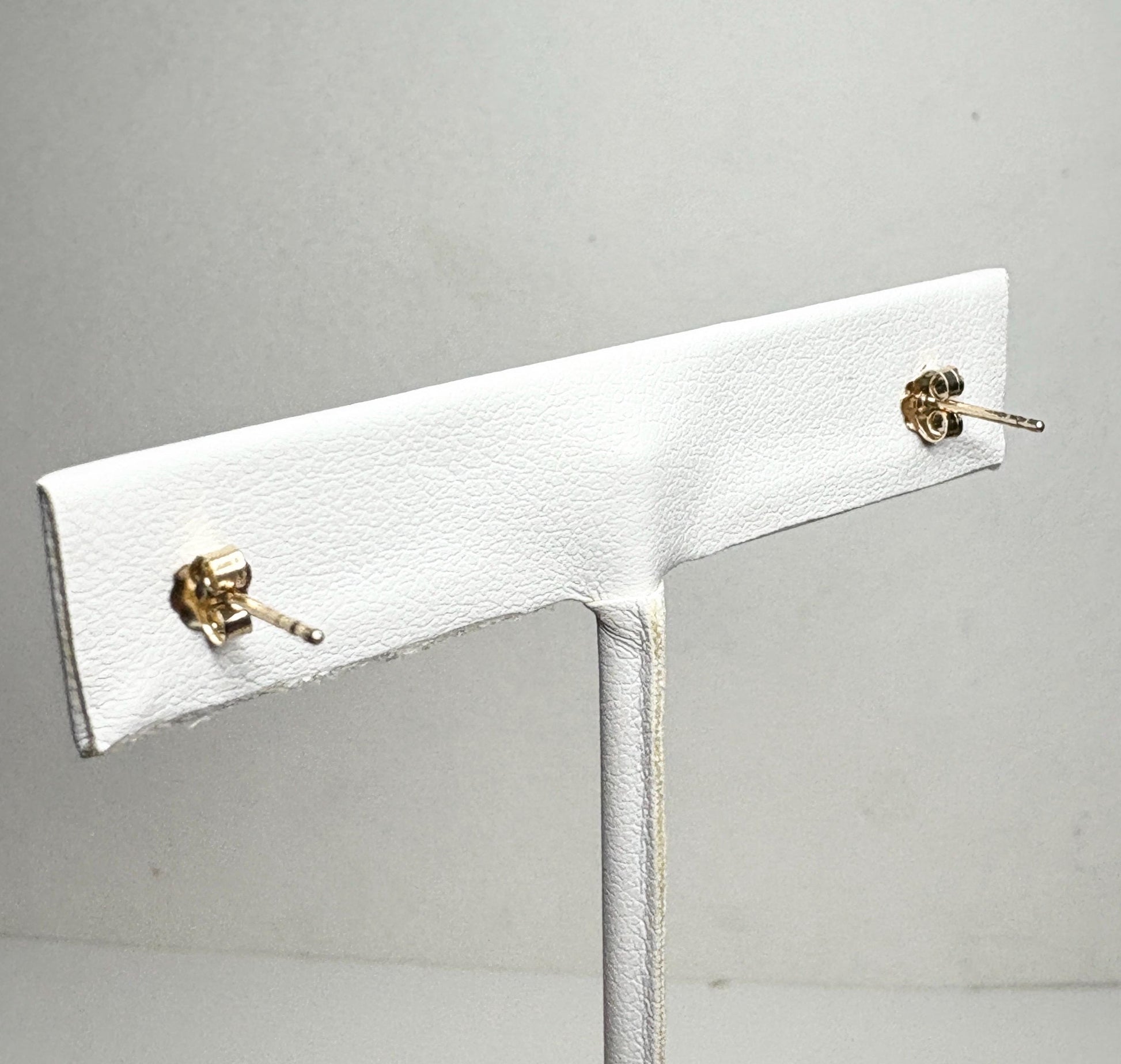 Spessartite garnet stud earrings in solid 9k gold.