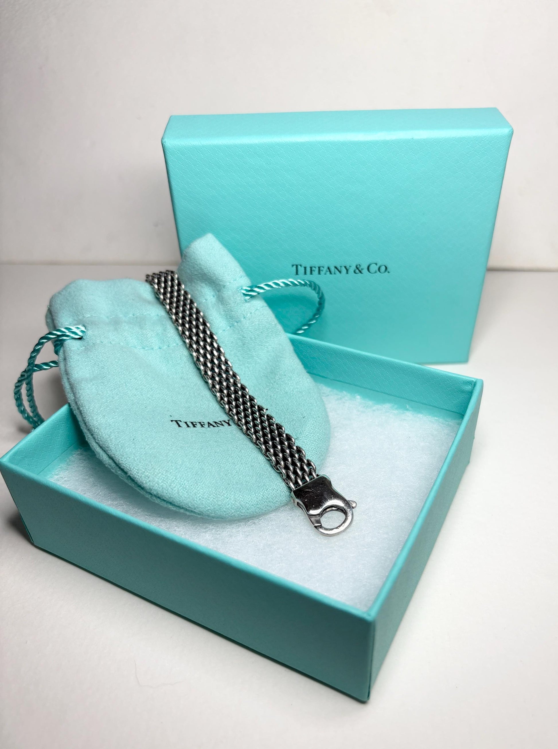 Vintage Tiffany & Co. sterling silver mesh bracelet with lobster claw clasp in a Tiffany box.