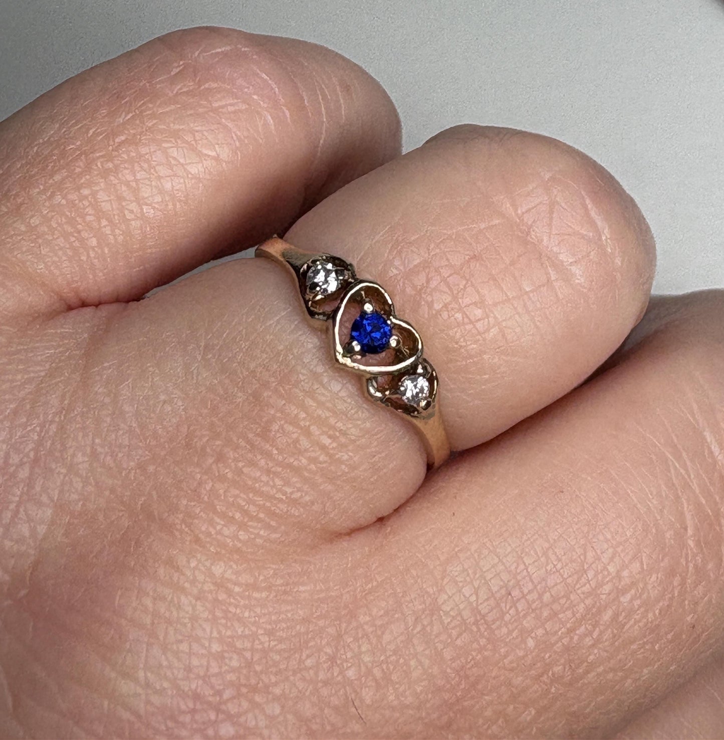 Vintage 10k gold heart ring with sapphire and diamonds.