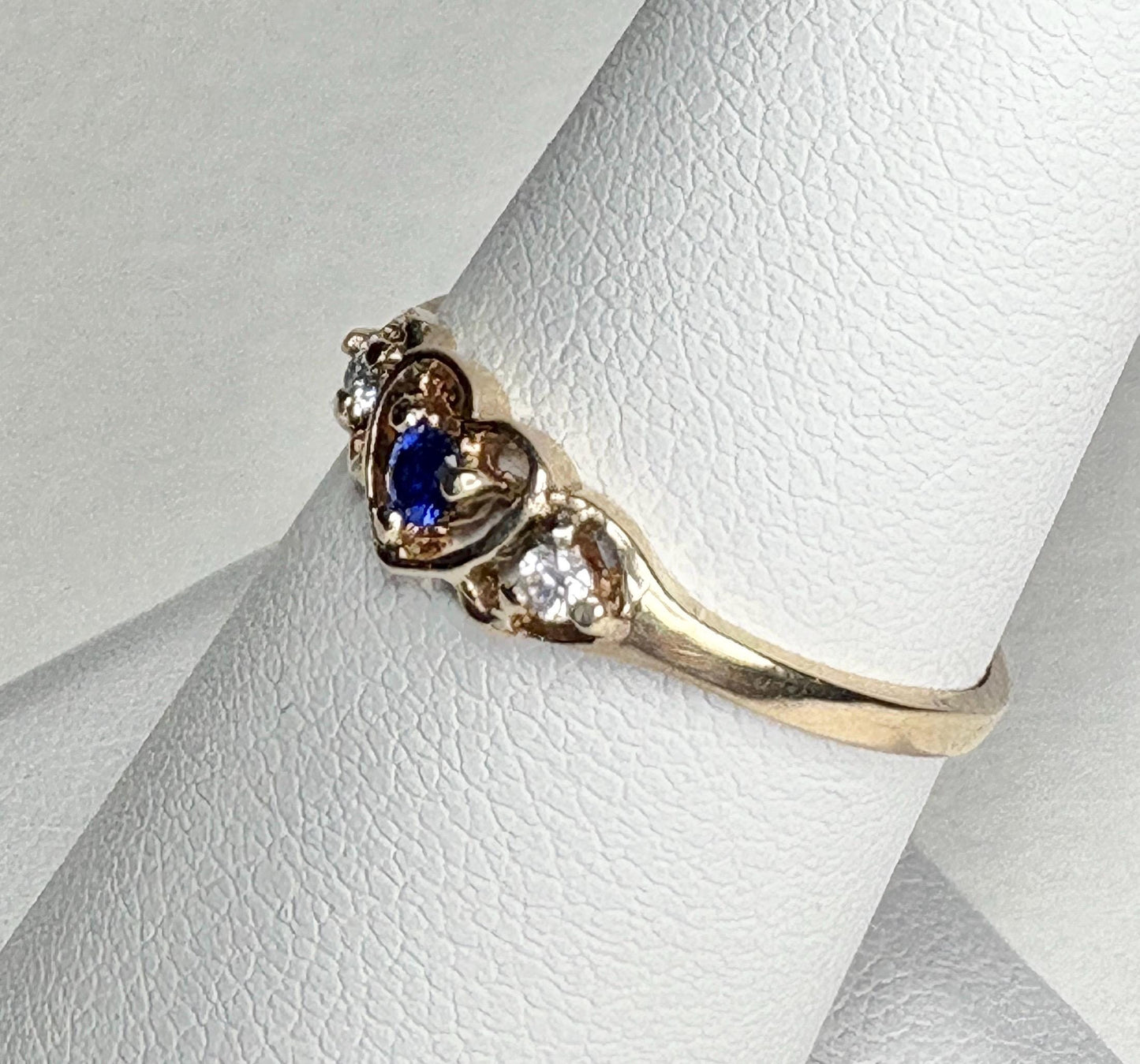 Vintage 10k gold heart band ring with violet blue sapphire and diamonds.
