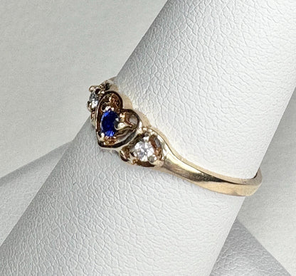 Vintage 10k gold heart band ring with violet blue sapphire and diamonds.