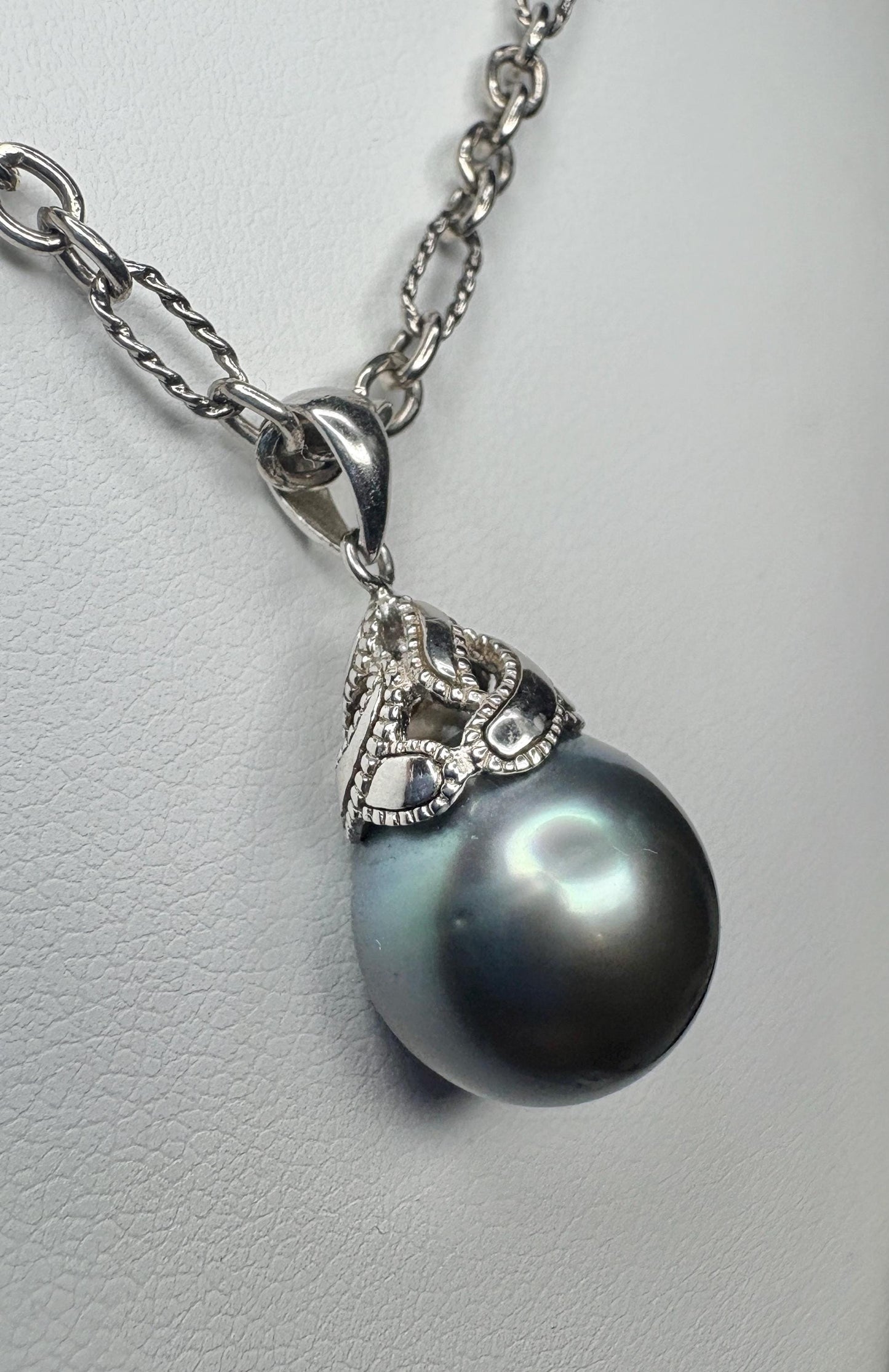Vintage Tahitian pearl pendant on a James Avery figaro chain.