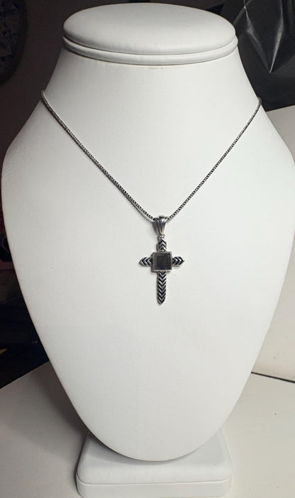 Sterling silver cross pendant necklace with a black inlay and a nano laser inscribed Bible.