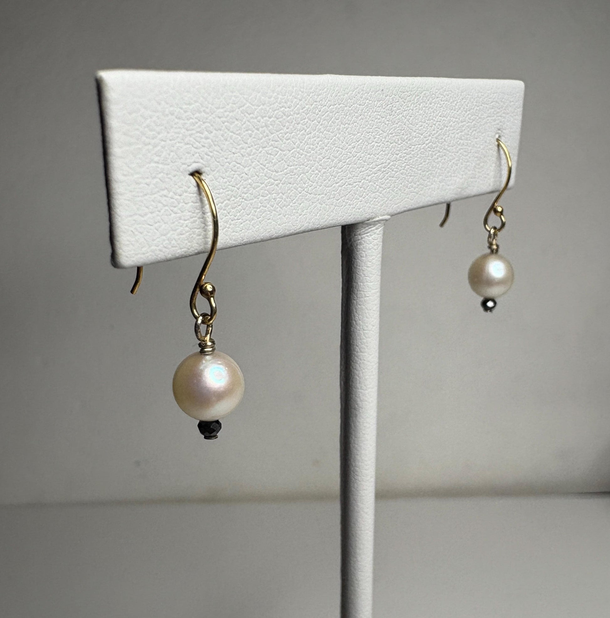 14k gold dangle earrings with 6mm Akoya pearls and 2mm black diamond beads.