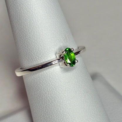 Sterling silver ring with a 3x5mm oval chrome diopside gemstone.