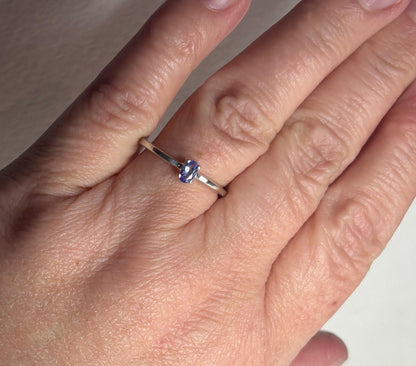 Sterling silver ring with a 5x3mm oval tanzanite gemstone.