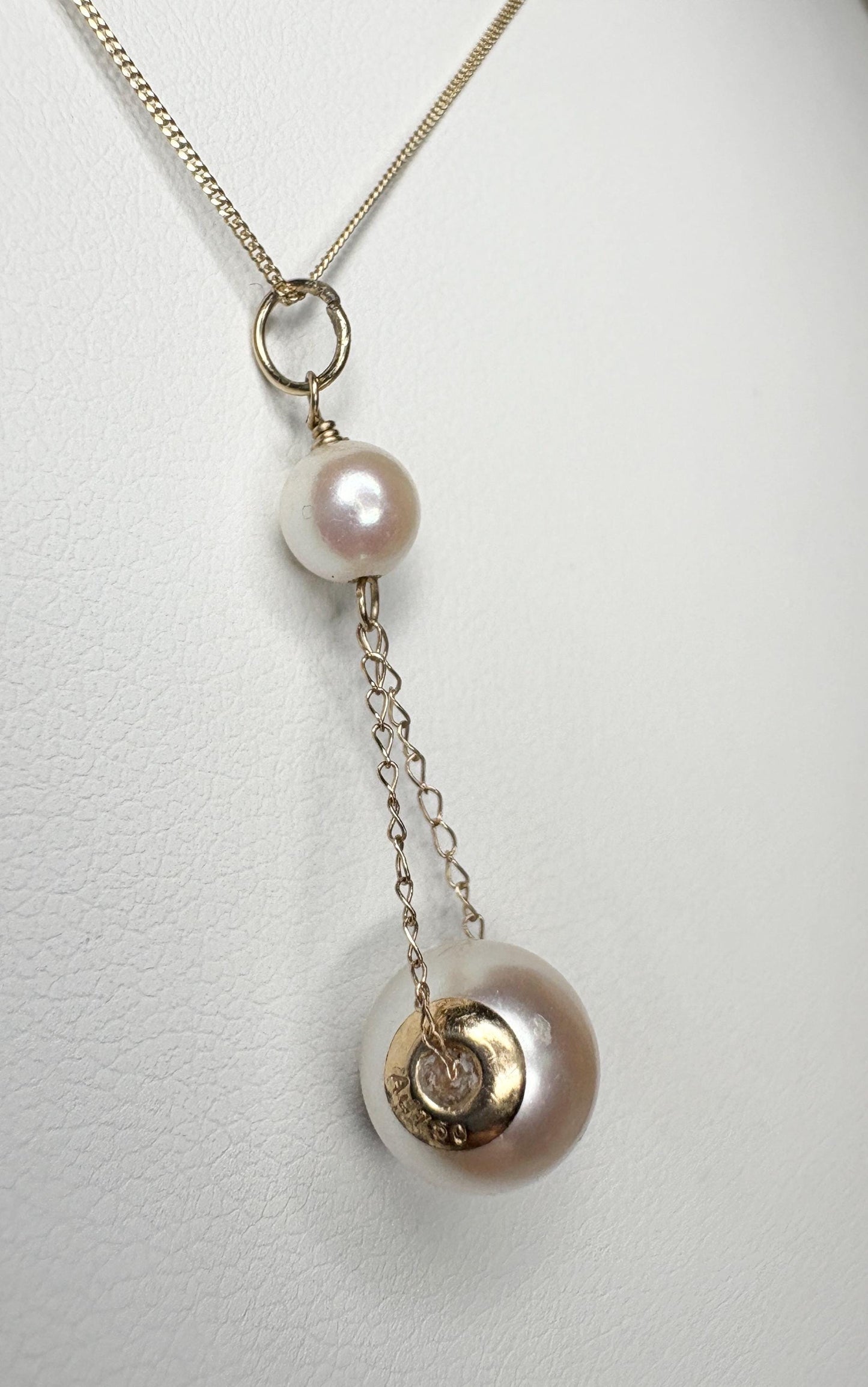 18k, 14k, and 9k gold lavaliere pendant necklace with two Akoya cultured pearls.