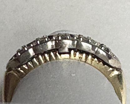 Vintage two-toned 10k gold band ring with small diamonds.