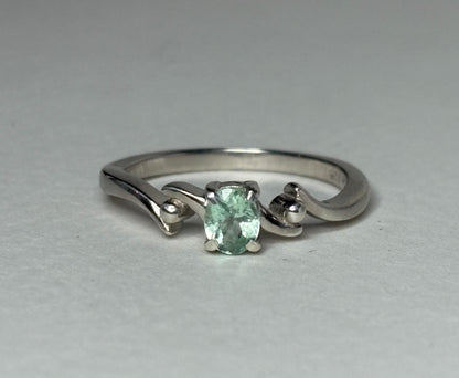 Sterling silver ring with an oval mint green tourmaline.