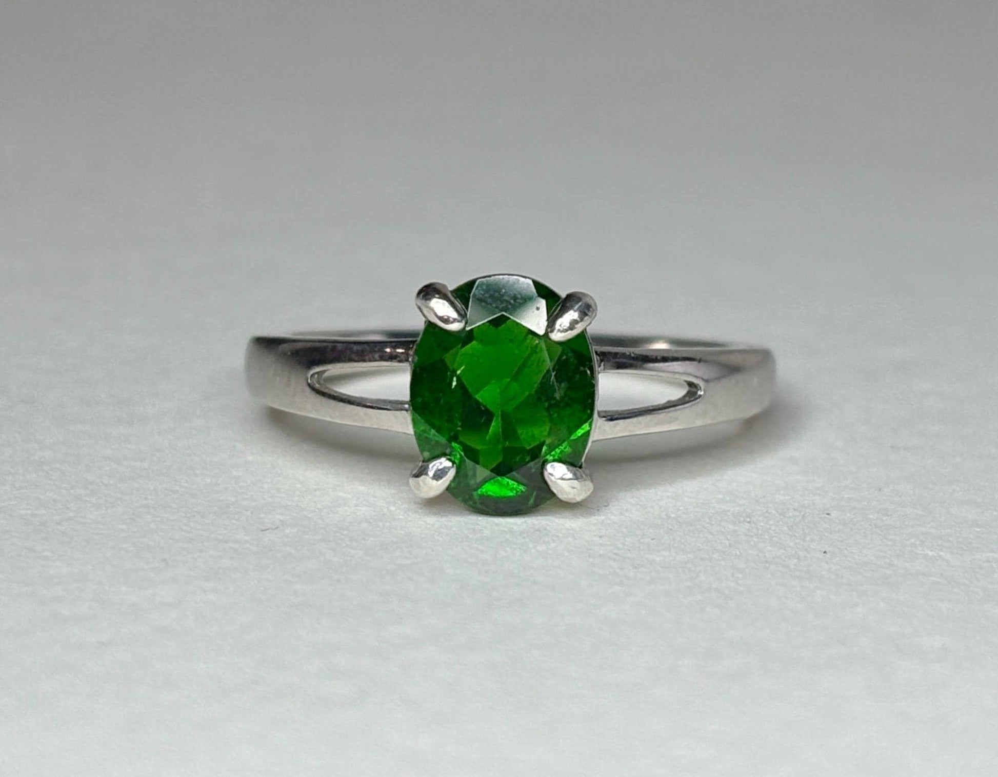 Oval chrome diopside solitaire sterling silver ring.
