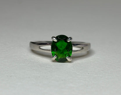 Oval chrome diopside solitaire ring in sterling silver.