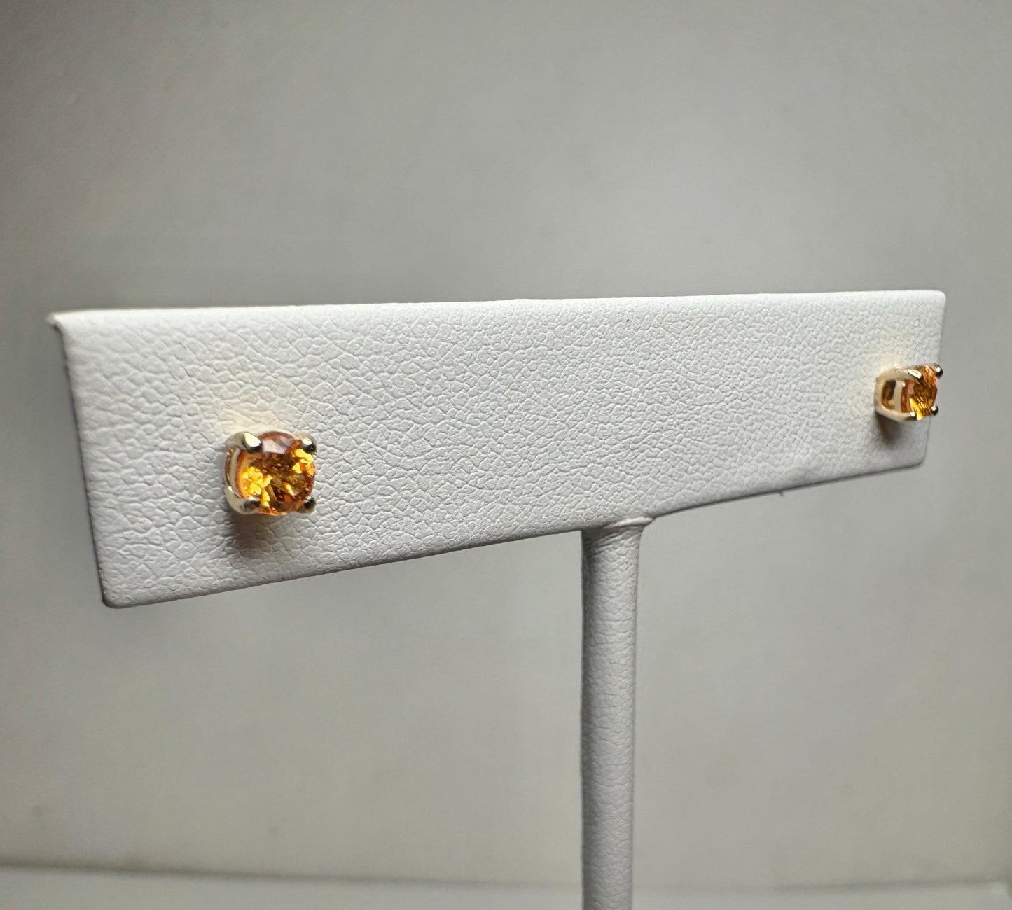 Spessartite garnet stud earrings in solid 9k gold.