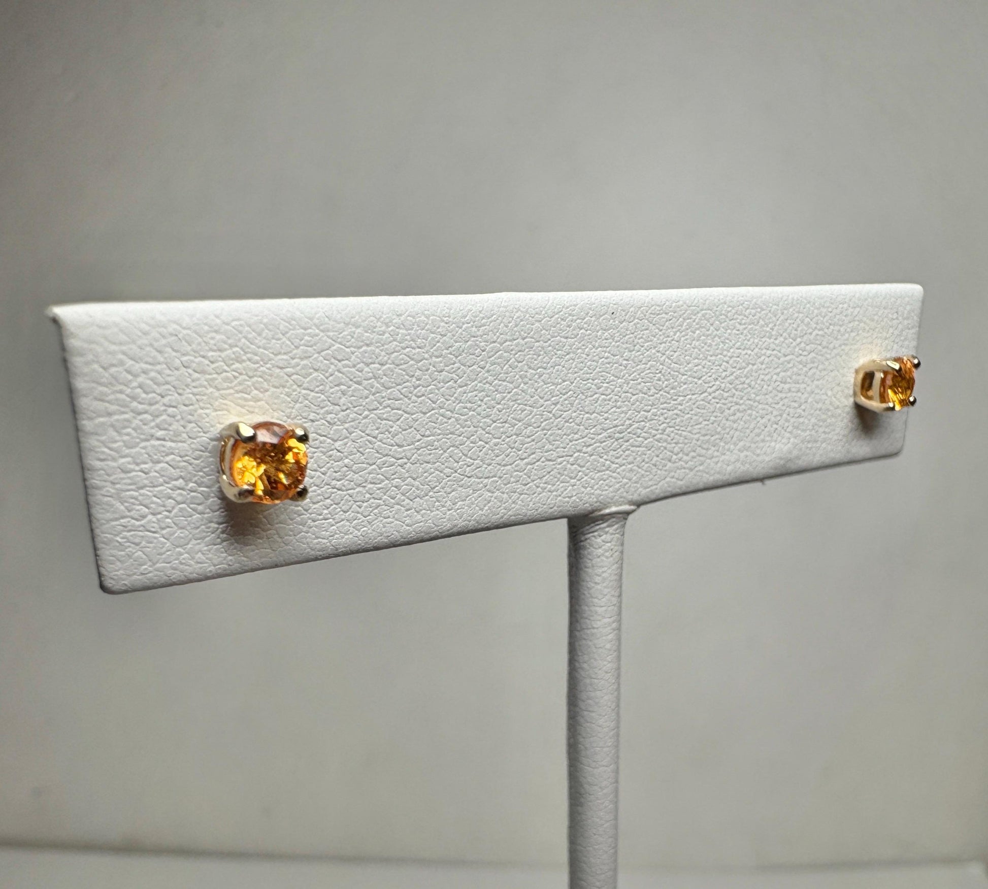 Spessartite garnet stud earrings in solid 9k gold.
