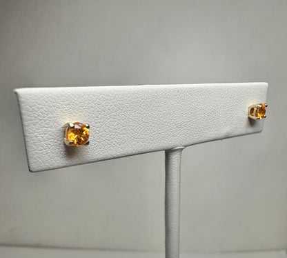 Spessartite garnet stud earrings in solid 9k gold.