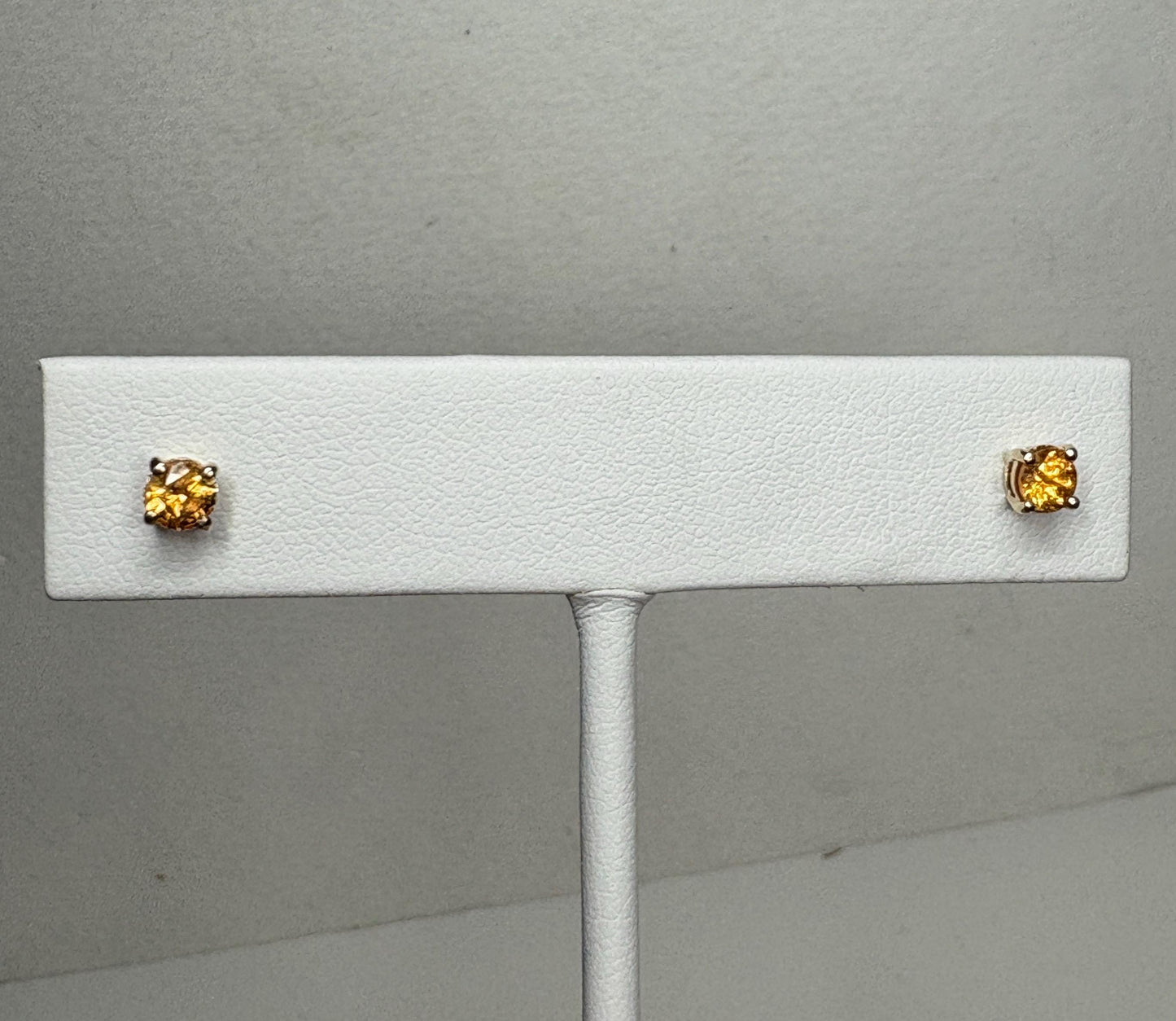 Spessartite garnet stud earrings in solid 9k gold.