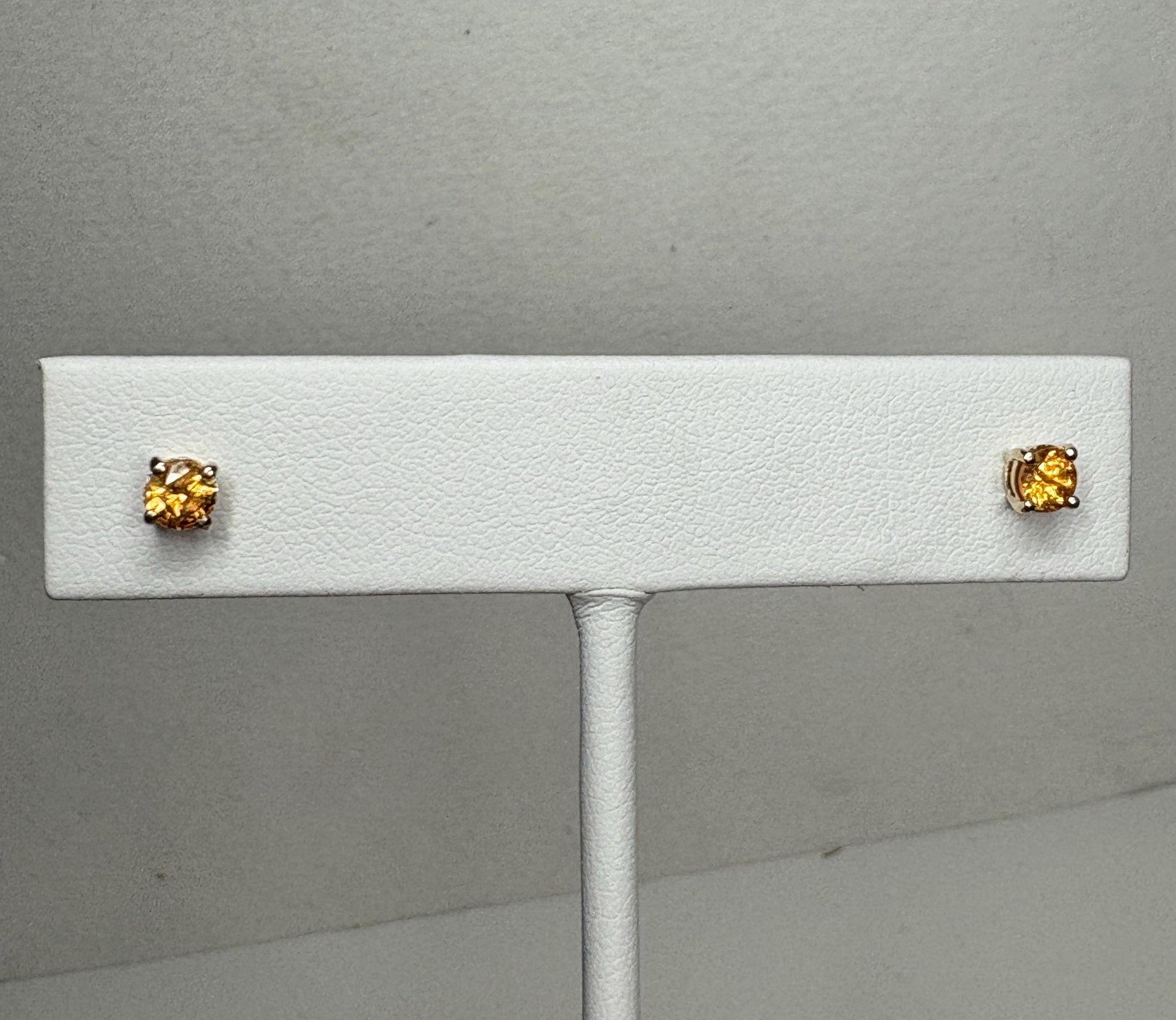 Spessartite garnet stud earrings in solid 9k gold.