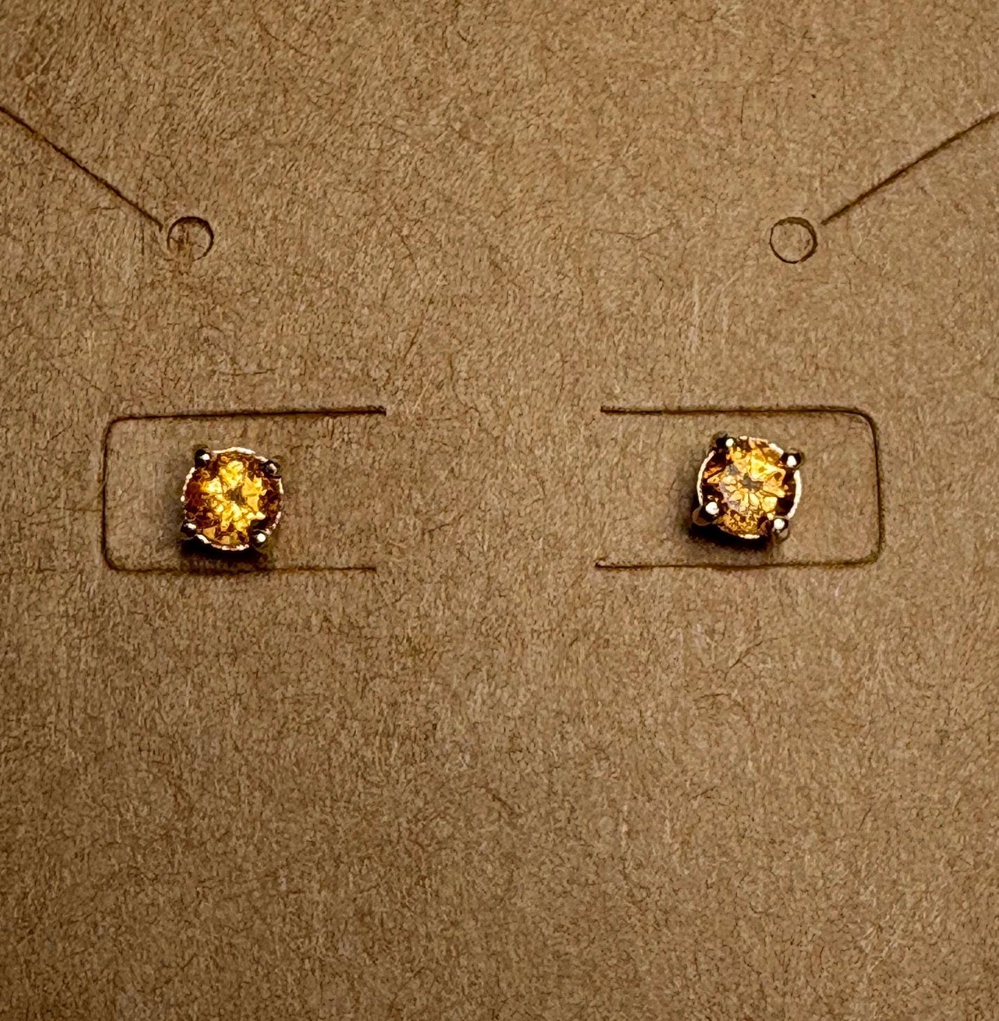 Spessartite garnet stud earrings in solid 9k gold.