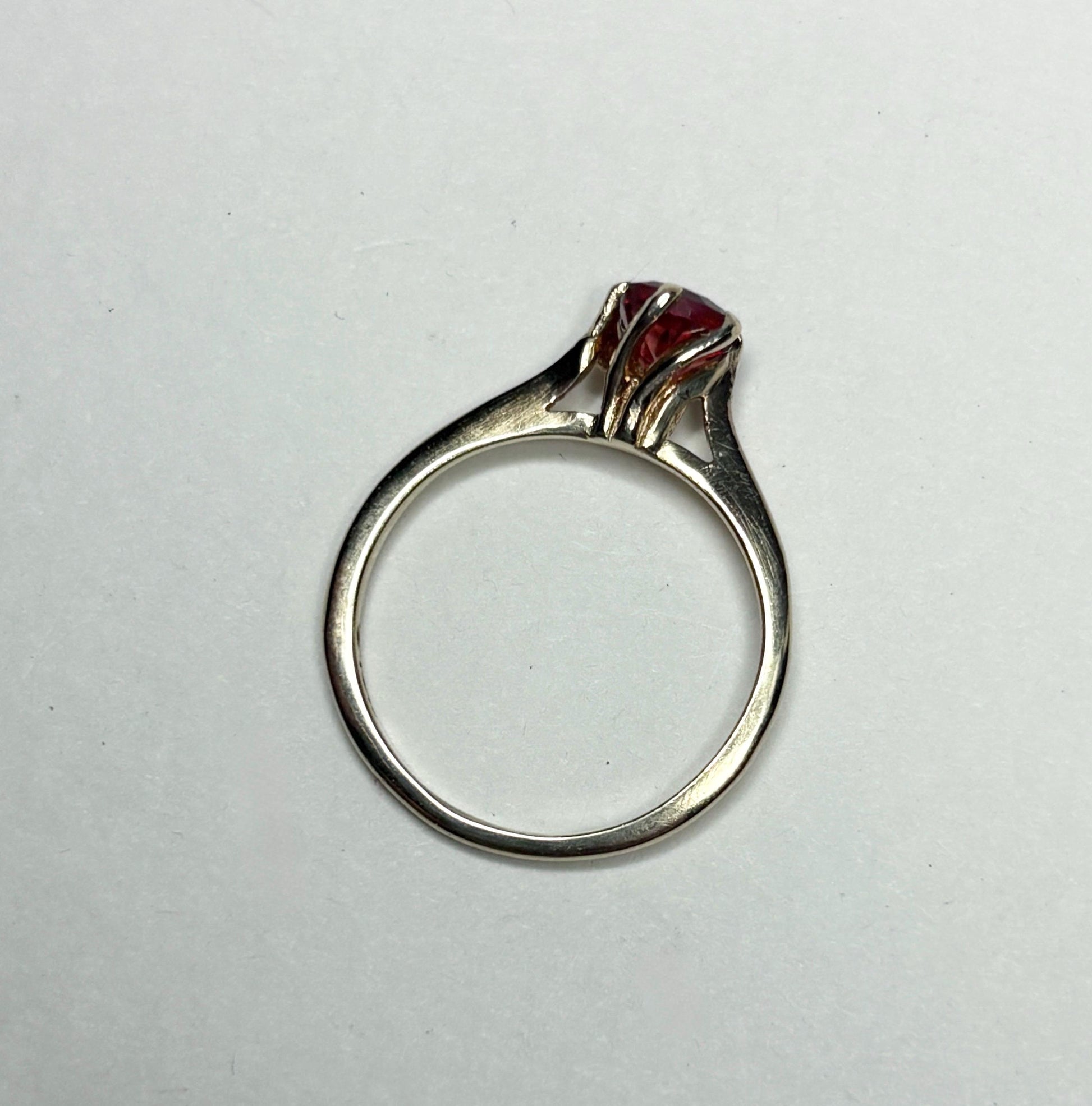 A 10k gold ring with a red Oregon sunstone.