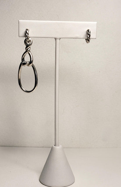 Sterling silver dangle earrings with twisted rope detail and oval drops.