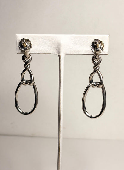 Sterling silver dangle earrings with 14k gold posts and twisted rope detail.