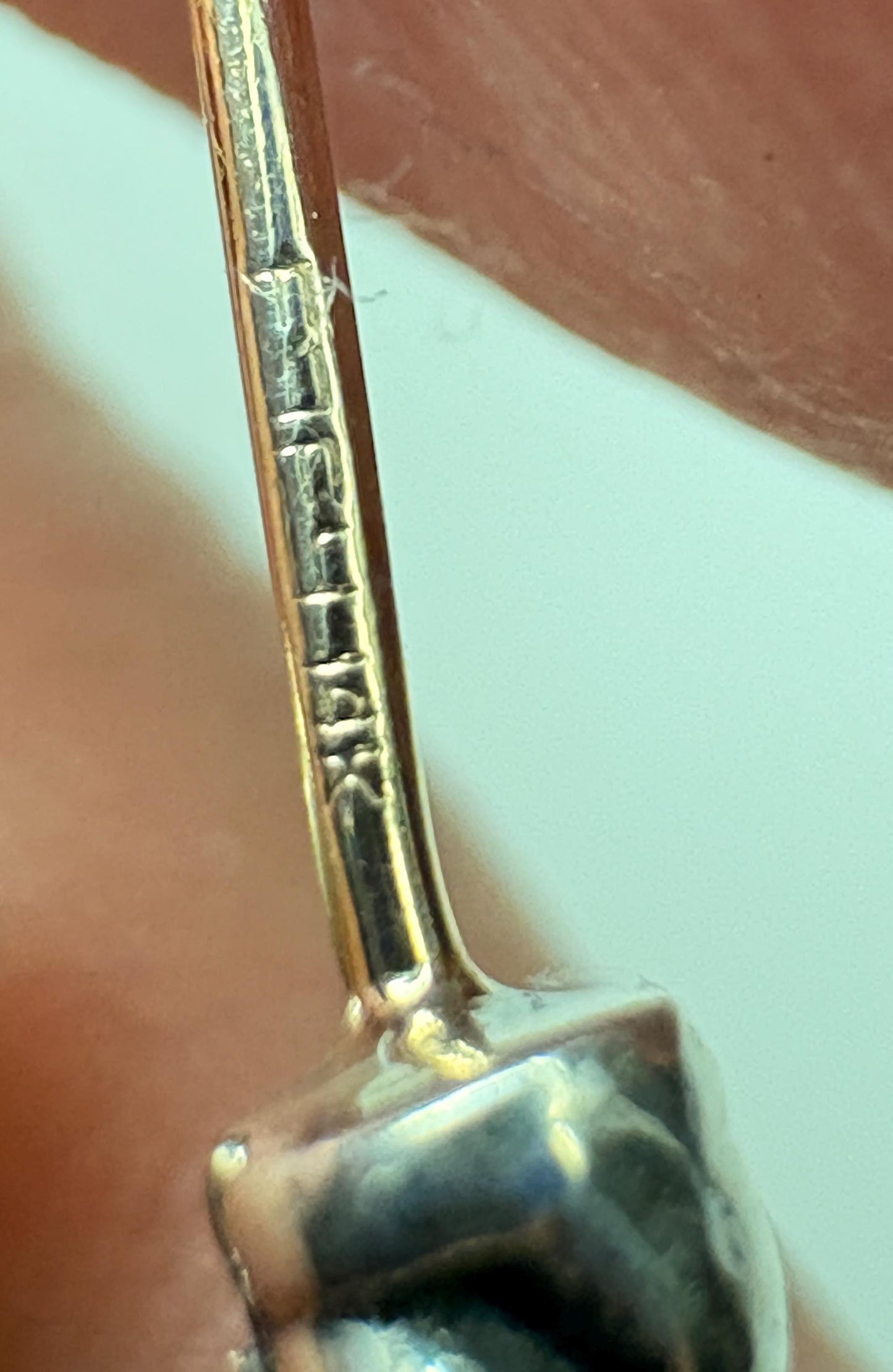 Sterling silver dangle earrings with 14k gold posts, marked DY.