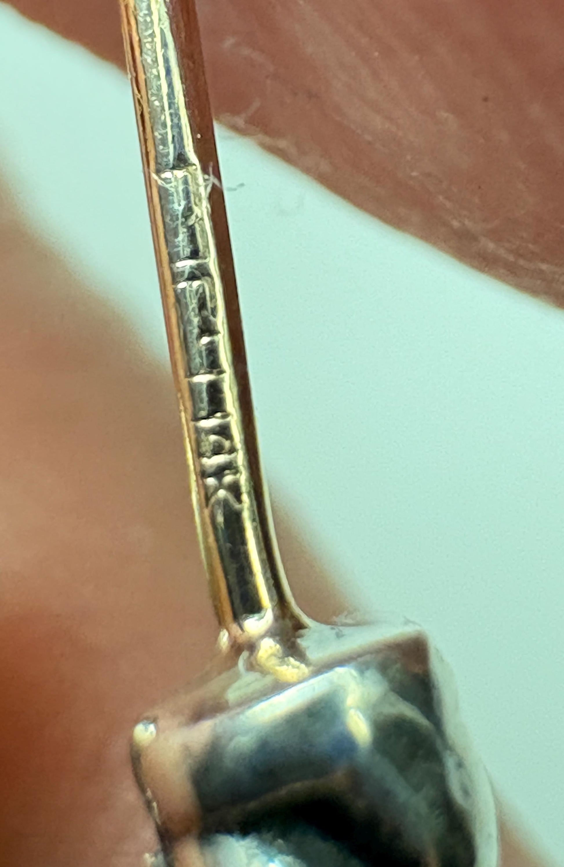 Sterling silver dangle earrings with 14k gold posts, marked DY.