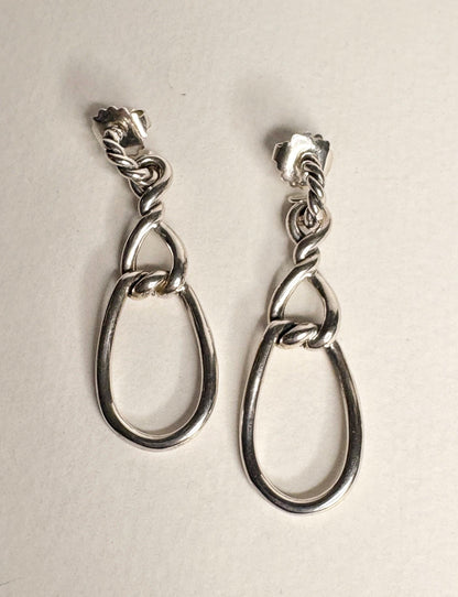 Sterling silver dangle earrings with twisted rope detail and 14k gold posts.
