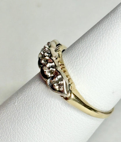 Vintage two-toned 10k gold band ring with small diamonds.