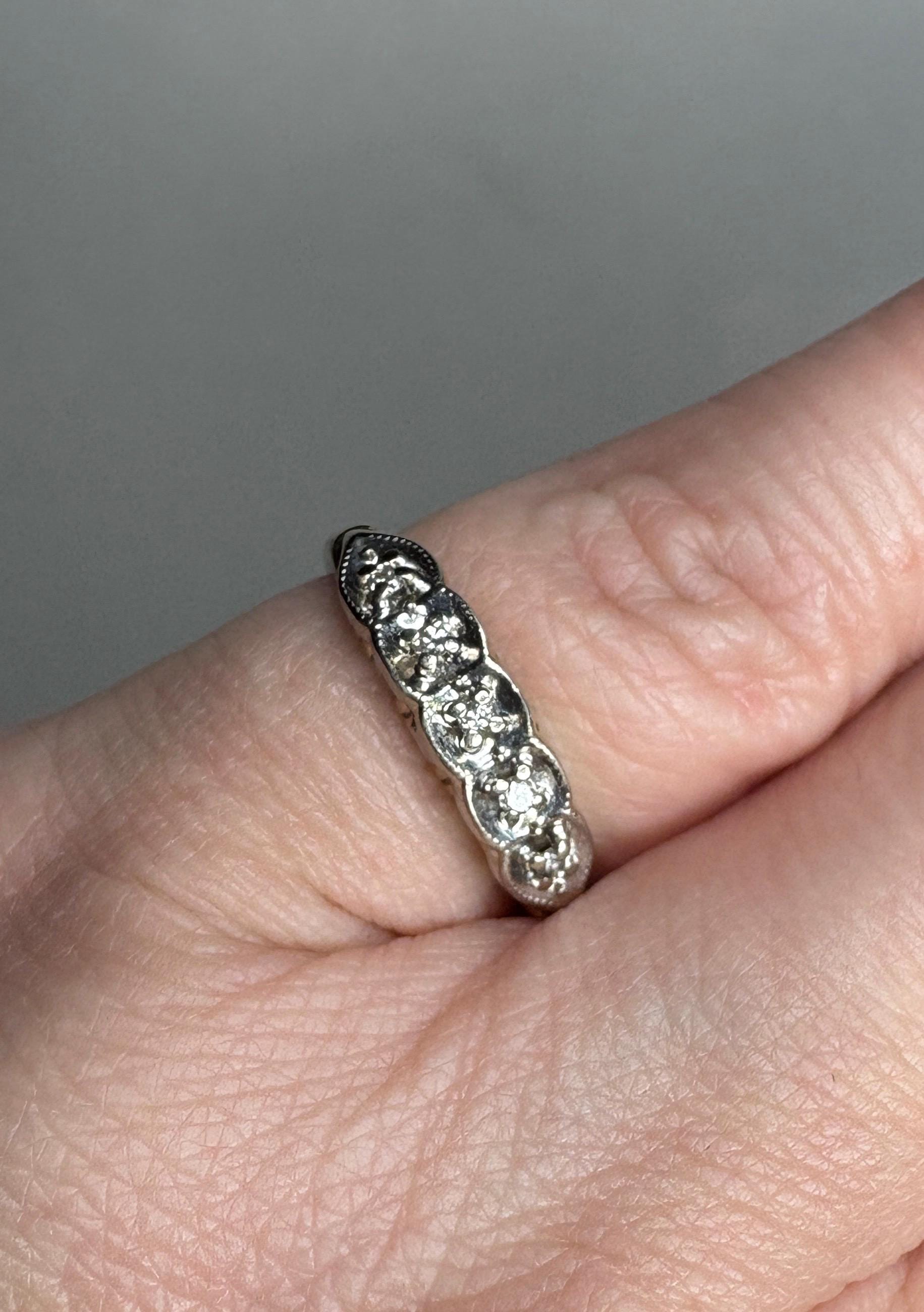 Vintage two-toned 10k gold band with five small diamonds.