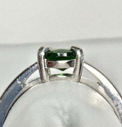 Sterling silver ring with a green oval chrome diopside stone.