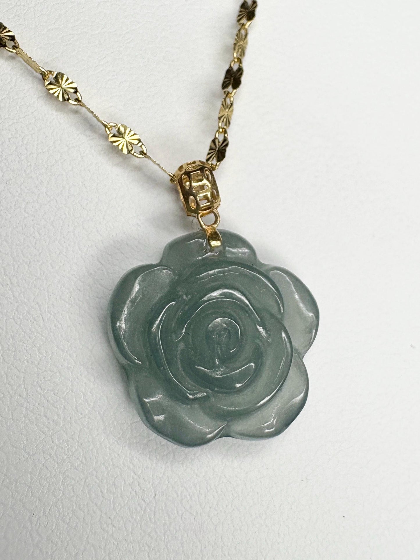 Teal jadeite jade rose pendant necklace on a 14k gold chain.