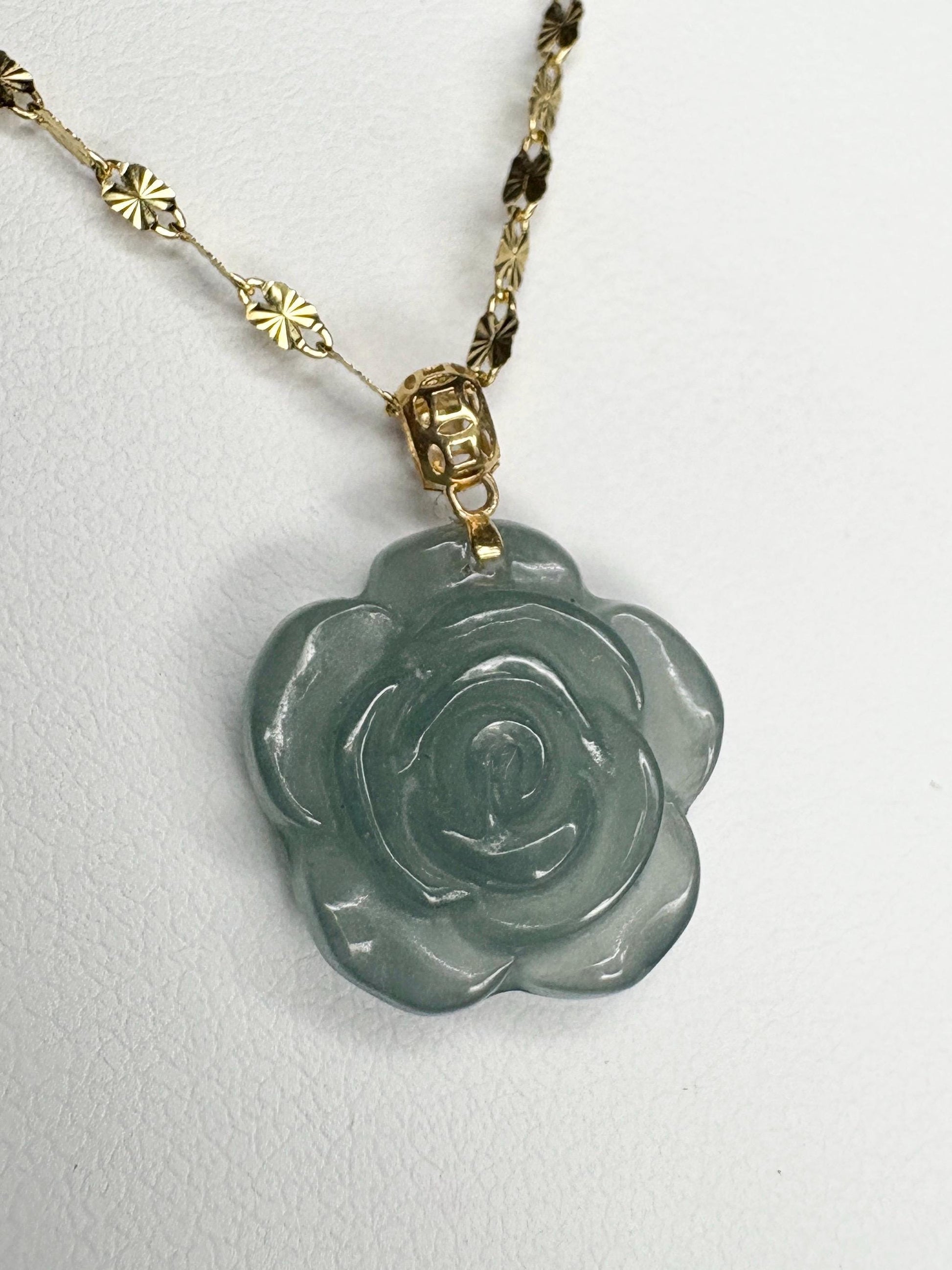 Teal jadeite jade rose pendant necklace on a 14k gold chain.