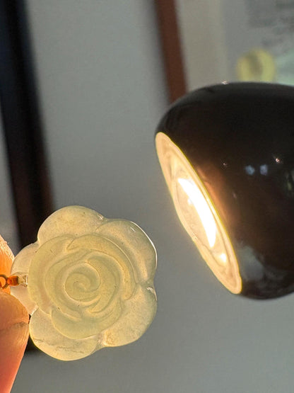 Teal jadeite jade rose pendant on an 18k bail and 14k gold chain.