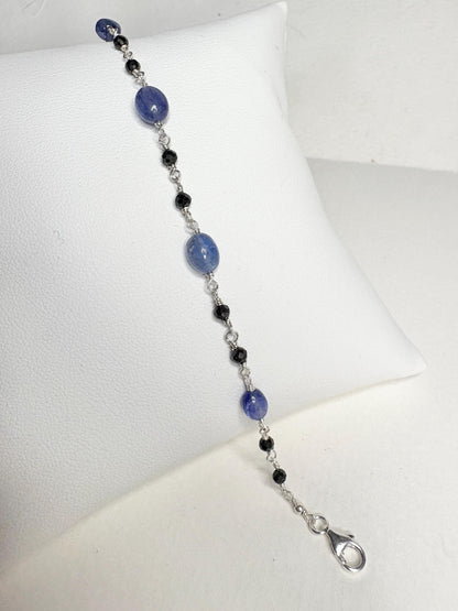 Sterling silver bracelet with black diamond and tanzanite beads.