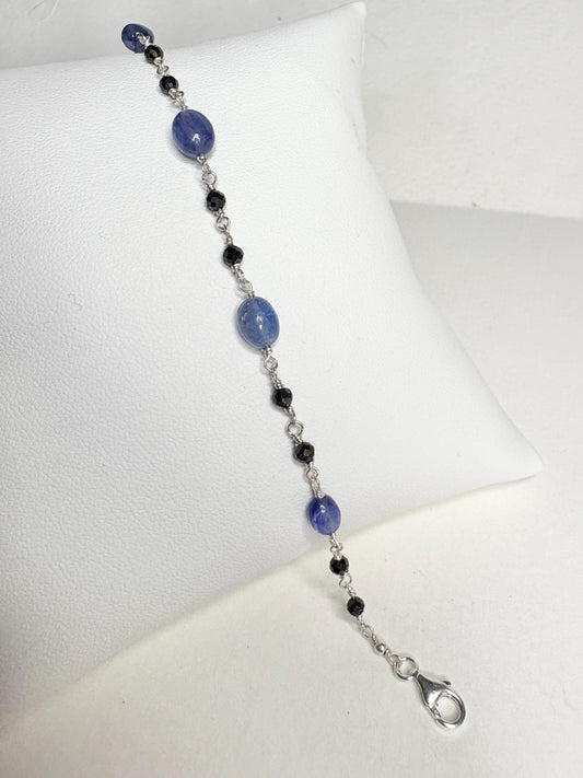 Sterling silver bracelet with black diamond and tanzanite beads.