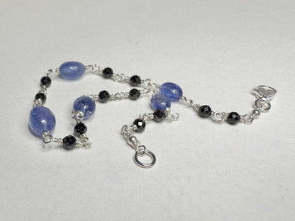 Sterling silver bracelet with black diamond and tanzanite beads.
