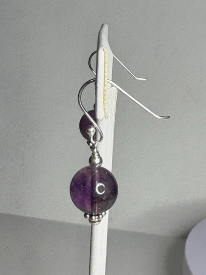 Sterling silver dangle earrings with 10mm natural amethyst beads.